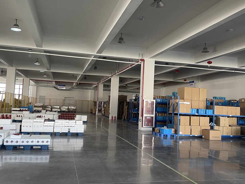 Suvell factory workshop source showing packed materials and dispatch staging