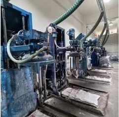 Low voltage bushing automatic material mixing